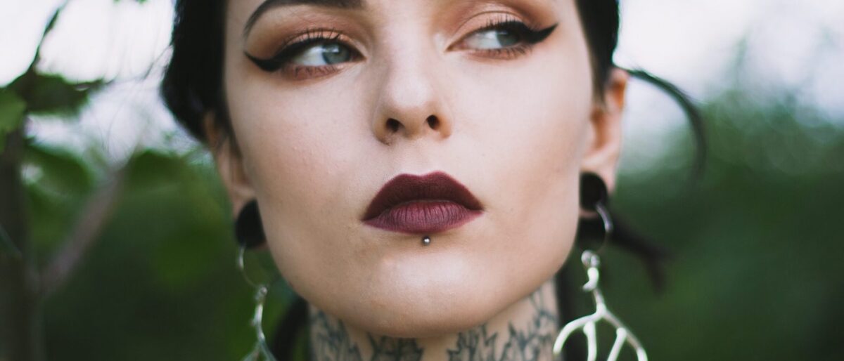 The Right Tattoo For Your Long Neck