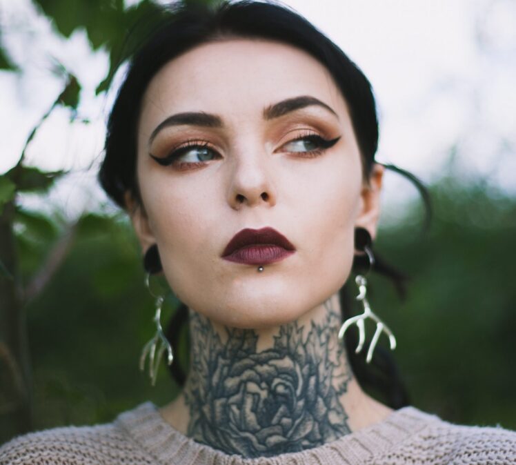 The Right Tattoo For Your Long Neck